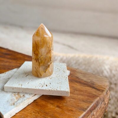 ponta de quartzo hematoide dourado surya cristais