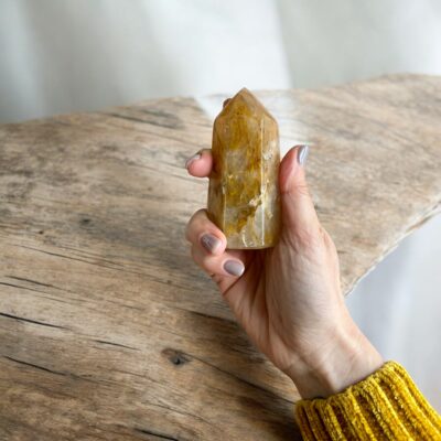 ponta de quartzo hematoide dourado surya cristais