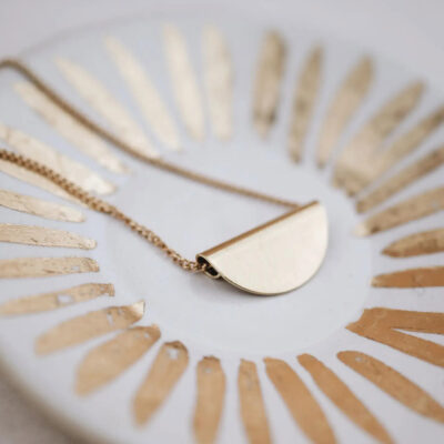 colar tot surya cristais