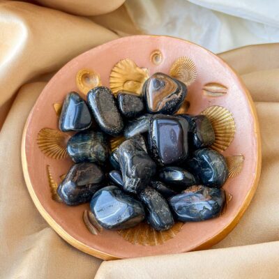 olho de falcão surya cristais