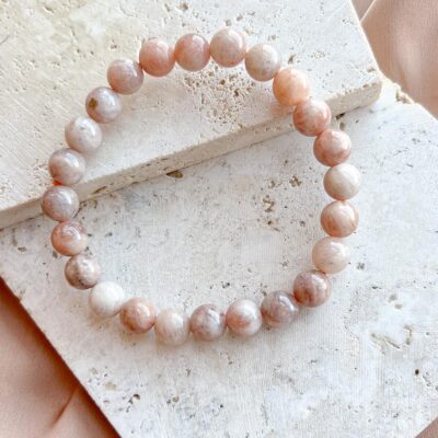 pulseira de pedra da lua rosa surya cristais